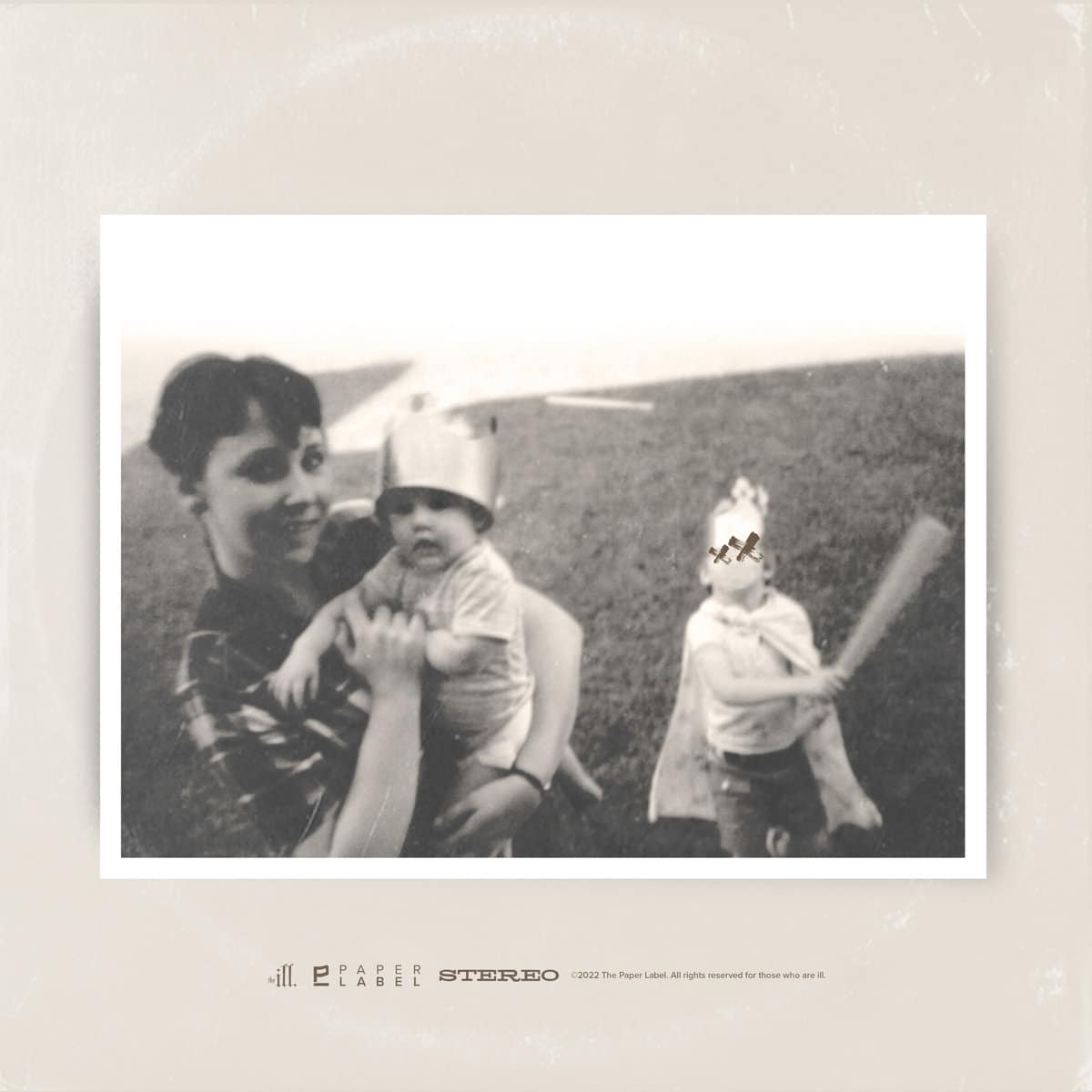The Kid Flames Golden Child cover art with old photo of he, his mom, and his baby sister in his mom's arms.